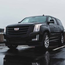 Black cadillac escalade parked